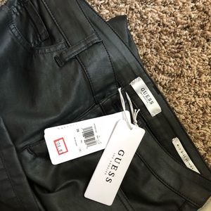 Coated mid rise skinny jeans